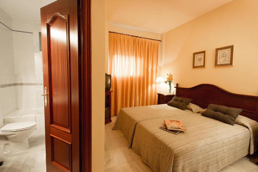 Hotel Gran Avenida Coria del Río Szoba fotó